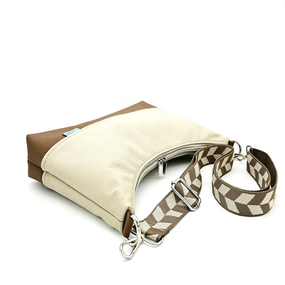 Ledertasche Levka, creme/cognac, auf der Seite liegend, Detail Gurt